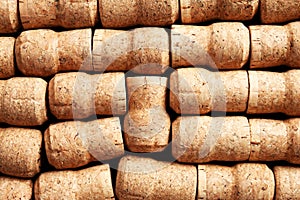 Many corks of wine bottles as background, top view