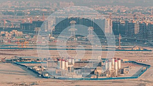 Many cranes working on modern constraction site works of new district timelapse