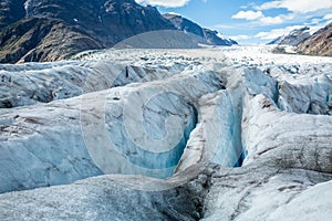 Many crevasses covering the surface of the Salmon Glacier near Hyder, Alaska make travel on the remote glacier very dangerous