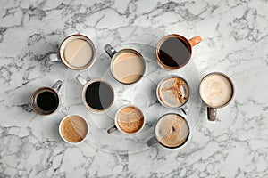 Many cups of different aromatic hot coffee