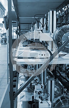 Many 3D printers printing an object. 3D printers simultaneously printing model