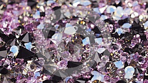 Many dark purple jewel stones background, loop ready