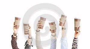 Many different arms raised up holding coffee cup