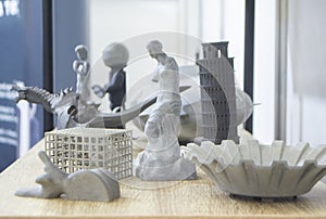 Many different art models from polyamide powder printed on 3D printer Technology