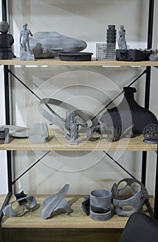 Many different art models from polyamide powder printed on 3D printer Technology