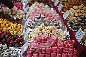 Many different colored sweets chocolate and fruit sweets