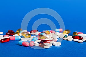 Many different colorful medication and pills perspective view. Set of many pills on colored background