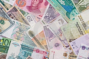 many different currency banknotes from world country