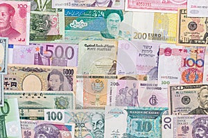 Many different currency banknotes from world country photo