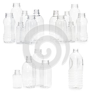 many different empty plastic bottles isolated on white background. production of new