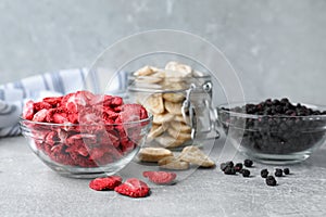 Many different freeze dried fruits on light grey table