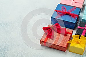 Many different multi-colored bright gift wraps with place for text