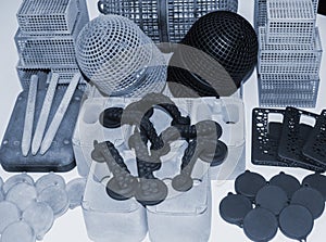 Many different objects printed on 3D printer from powder polyamide.