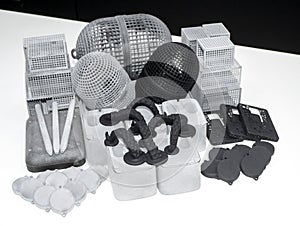 Many different objects printed on 3D printer from powder polyamide