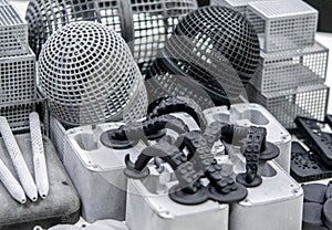 Many different objects printed on 3D printer from powder polyamide.