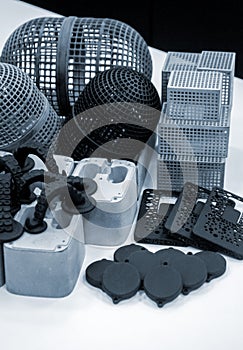 Many different objects printed on 3D printer from powder polyamide.