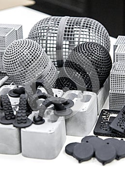 Many different objects printed on 3D printer from powder polyamide.