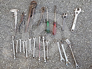Old worn used tools on ground