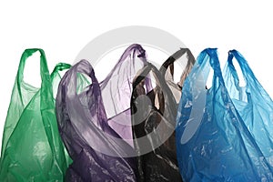 Many different plastic bags on white background
