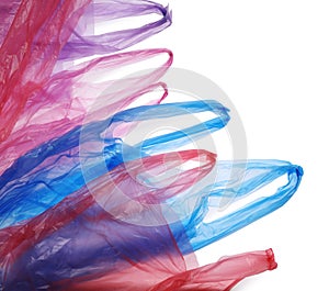 Many different plastic bags on white background