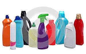 Many different plastic bottles of cleaning products
