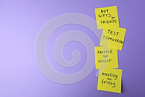 Many different reminder notes on violet background, flat lay. Space for text