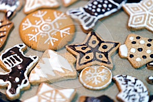 Many different shapes and drawings of homemade Christmas gingerbread on paper