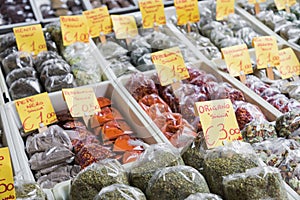 Many different traditional italian colorful spices at market in