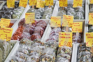 Many different traditional italian colorful spices at market in