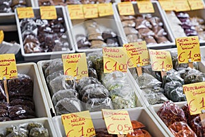 Many different traditional italian colorful spices at market in