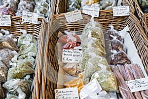 Many different traditional italian colorful spices at market in