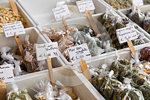 Many different traditional italian colorful spices at market in