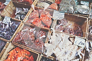 Many different traditional italian colorful spices at market in