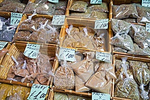 Many different traditional italian colorful spices at market in