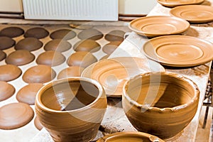 Many earthen pots kept for drying