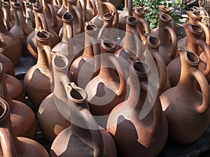 Many earthenware jugs for wine