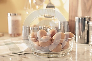 Many eggs in a glass bowl