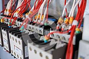 Many electrical wires are connected to contactors