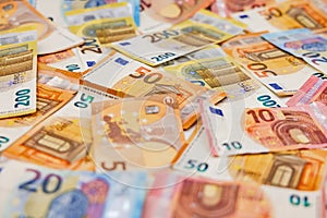 Many 50 and 200 euro banknotes for payment with cash or paper money