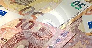 Many Euro bills lie on top of each other. Bunch of money