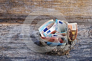Many euro notes in a nest