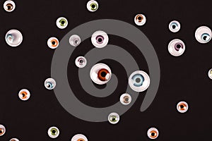 Many eyes on black background