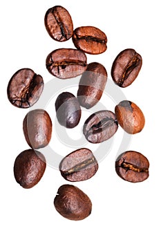 Many falling roasted coffee beans