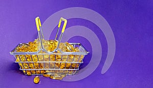 many of fish oil capsules stacked in a grocery basket