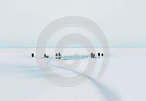 Many fishermen sit on the ice and fishing in winter cold