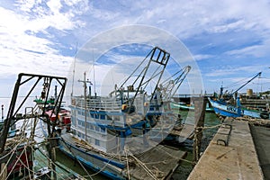Many fishing boats are docking at the sea in Chon Buri Province