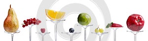 Many fresh fruit presented on glass stem
