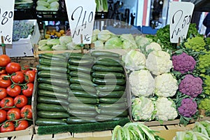 Many fresh vegetables with prices photo