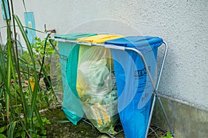 Many garbage cans with sorted garbage. Sorting garbage. Ecology and recycle concept. Recycling garbage elements garbage