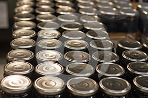 Many glass jars canned in a warehouse or wholesale store